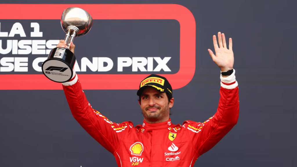 SUZUKA, JAPAN - APRIL 07: Third placed Carlos Sainz of Spain and Ferrari celebrates on the podium